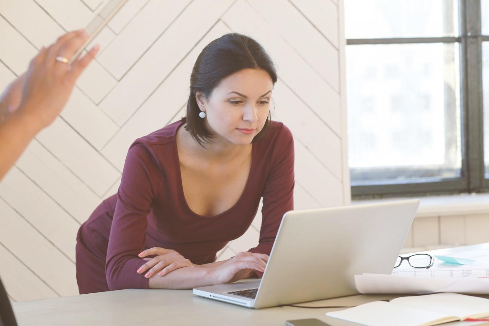 Budget planning workspace with financial documents and calculator